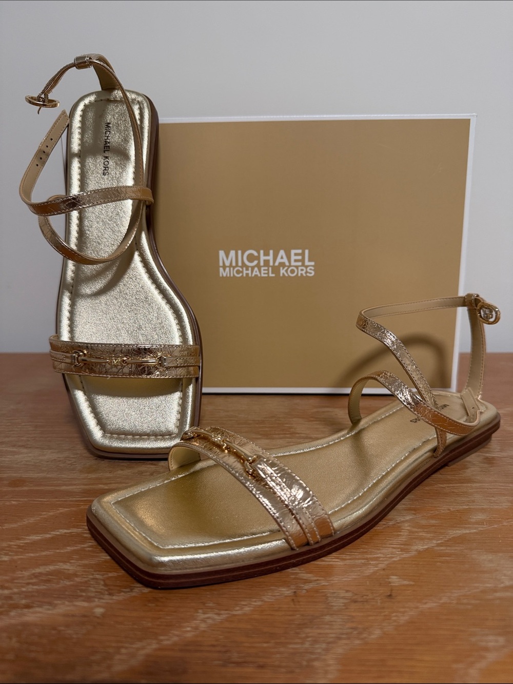 MICHAEL Michael Kors Lena Flat Sandal Metallic Leather Pale Gold